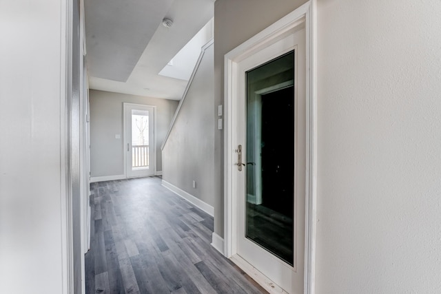 hall with light hardwood / wood-style flooring