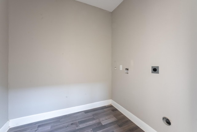 clothes washing area with electric dryer hookup, dark hardwood / wood-style floors, and hookup for a washing machine