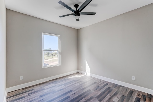 spare room featuring ceiling fan and wood-type flooring