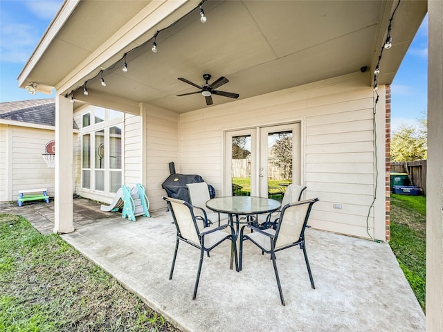 view of patio featuring ceiling fan