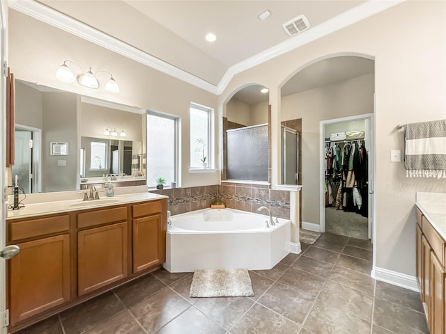 bathroom with shower with separate bathtub, vanity, and crown molding