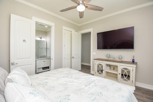 bedroom with dark hardwood / wood-style flooring, ensuite bathroom, ceiling fan, and ornamental molding