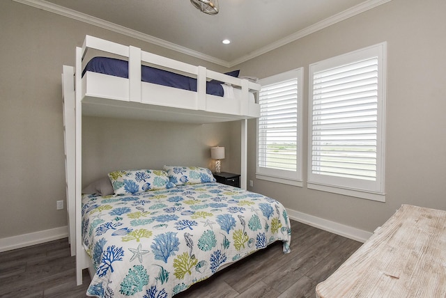 bedroom with crown molding and dark wood-type flooring