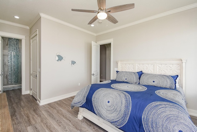 bedroom with hardwood / wood-style floors, ceiling fan, and ornamental molding