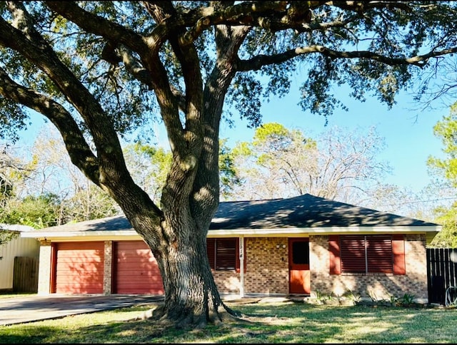 single story home with a garage