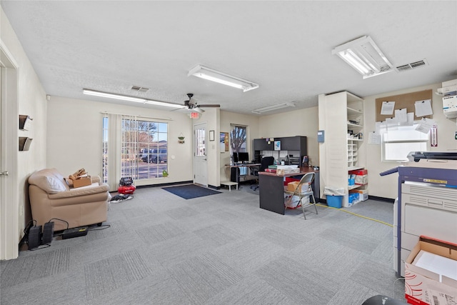 interior space featuring ceiling fan