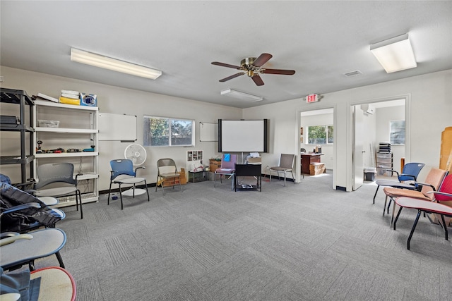 interior space with plenty of natural light and ceiling fan