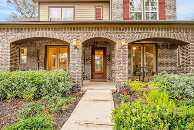 entrance to property featuring a porch