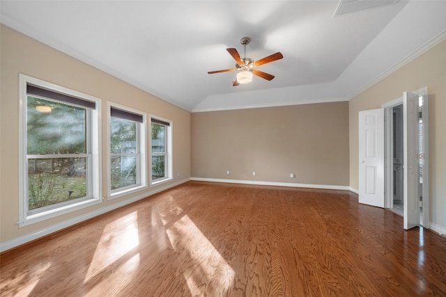 unfurnished room featuring ceiling fan, wood-type flooring, lofted ceiling, and crown molding