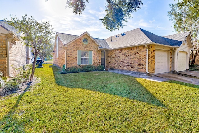 view of front of home featuring a front lawn and a garage