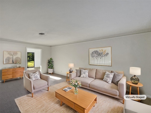 carpeted living room featuring ornamental molding