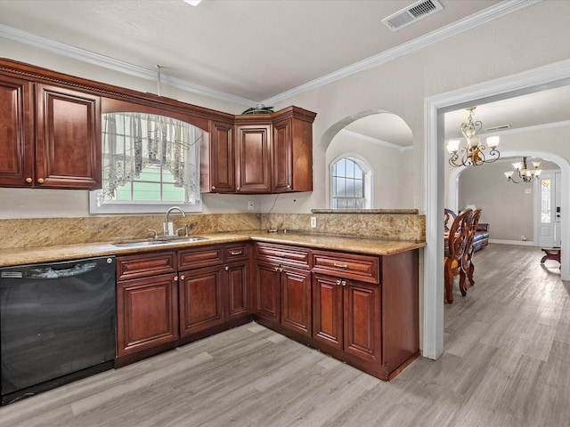 kitchen featuring a notable chandelier, sink, black dishwasher, and a wealth of natural light