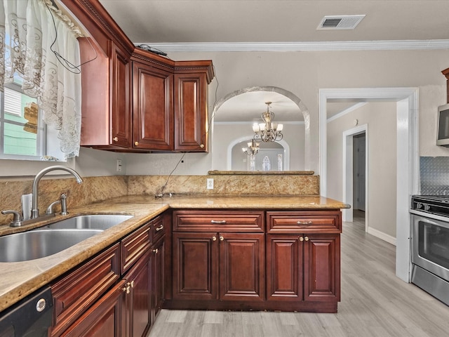 kitchen featuring crown molding, sink, stainless steel stove, and an inviting chandelier