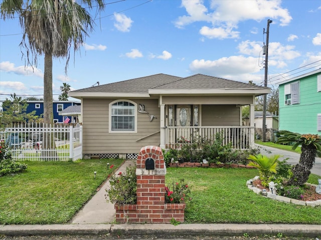 bungalow-style home featuring a porch and a front yard