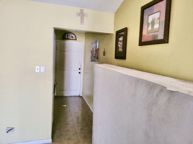 hall featuring tile patterned flooring