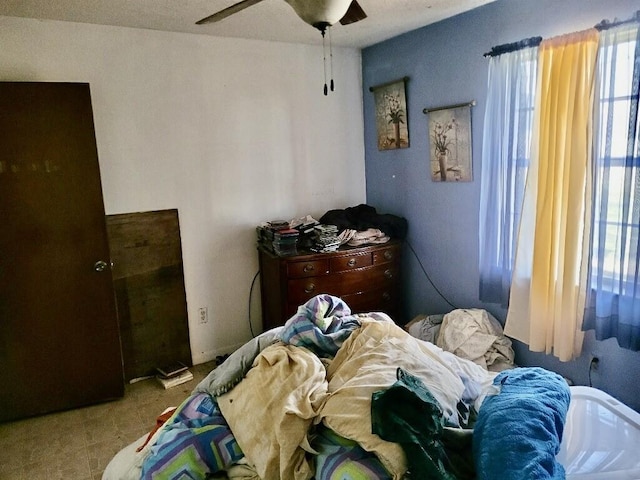 bedroom featuring ceiling fan