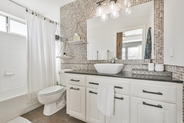 full bathroom with shower / tub combo, backsplash, tile walls, tile patterned flooring, and toilet