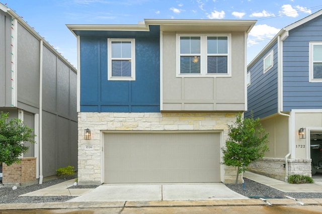 view of front of property featuring a garage