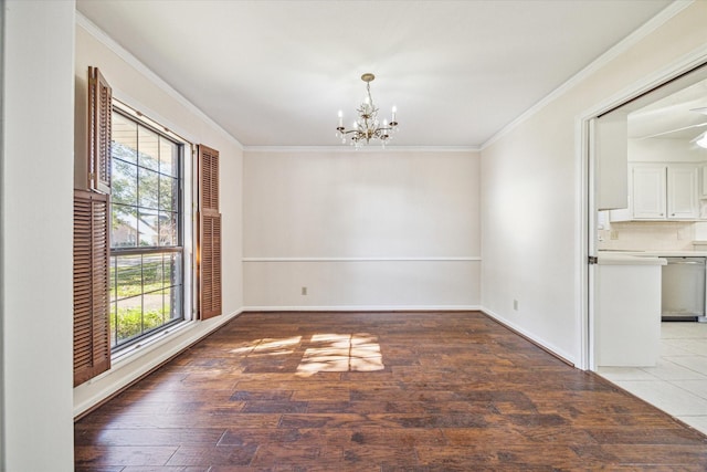 unfurnished dining area featuring wood-type flooring, an inviting chandelier, a wealth of natural light, and crown molding