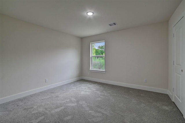 spare room with carpet flooring