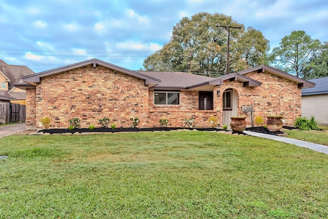 ranch-style house with a front yard