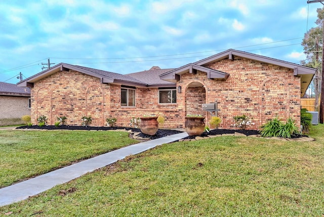 ranch-style house with a front yard