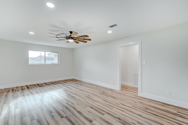 empty room featuring light hardwood / wood-style floors and ceiling fan