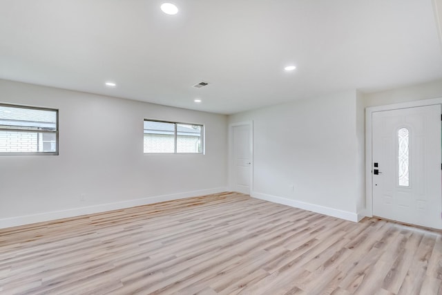 foyer with light hardwood / wood-style flooring