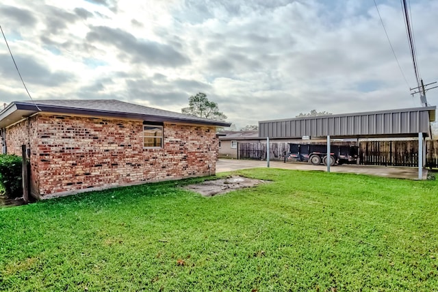 view of yard featuring a carport