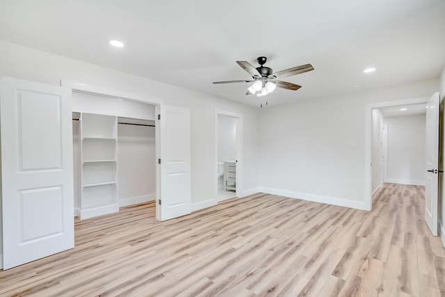 unfurnished bedroom featuring a closet, light hardwood / wood-style flooring, and ceiling fan