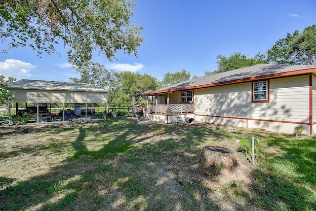 view of yard with a carport