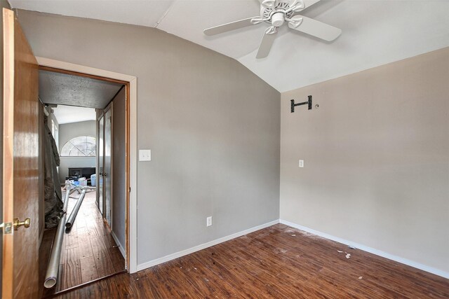 unfurnished room featuring wood-type flooring, vaulted ceiling, and ceiling fan