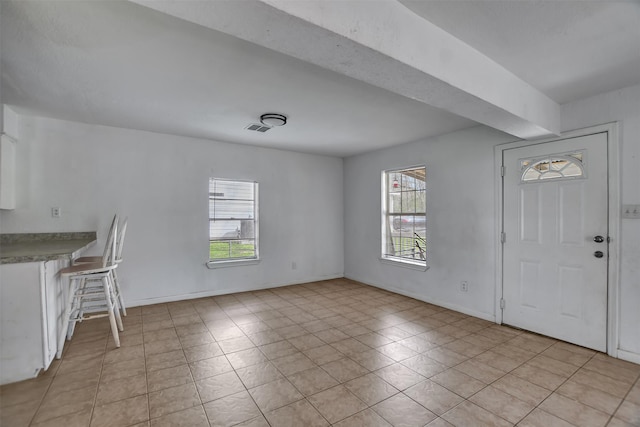 entryway featuring visible vents and baseboards