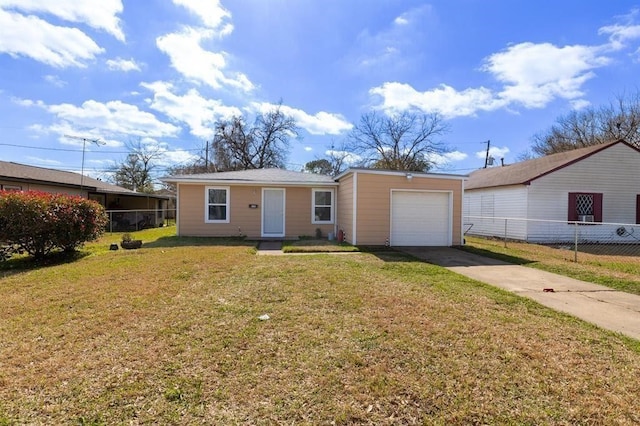 ranch-style house featuring a garage and a front yard