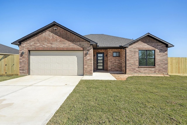 ranch-style house with a front yard and a garage