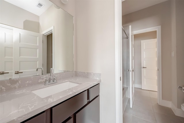 bathroom featuring vanity and tile patterned floors