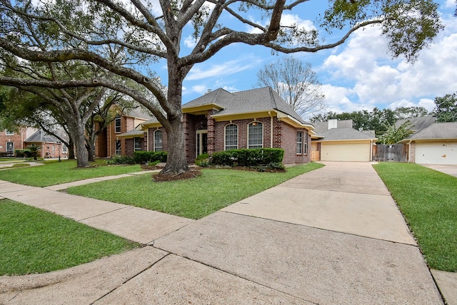 single story home featuring a garage and a front lawn