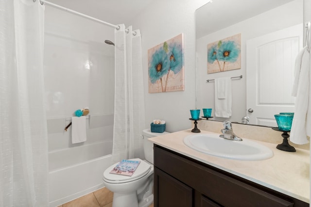 full bathroom featuring tile patterned floors, shower / bath combo, toilet, and vanity