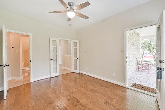 unfurnished bedroom featuring access to outside, ceiling fan, french doors, and light hardwood / wood-style floors