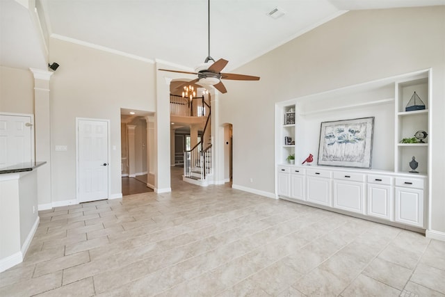 unfurnished living room with ceiling fan, built in features, crown molding, and high vaulted ceiling