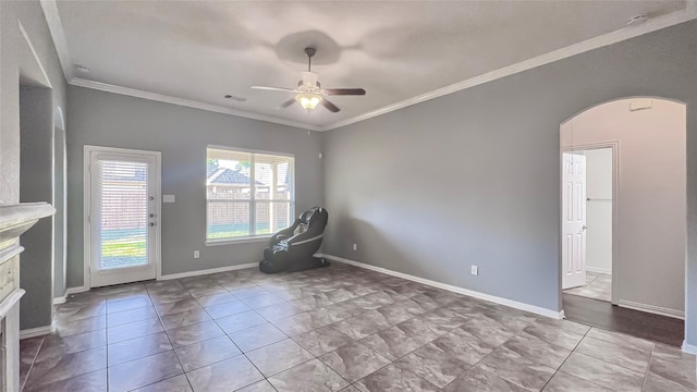 interior space featuring light tile patterned floors, ceiling fan, and crown molding