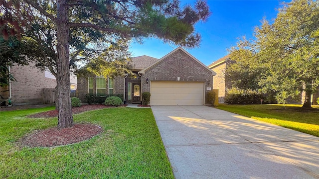 view of front of house featuring a garage and a front lawn