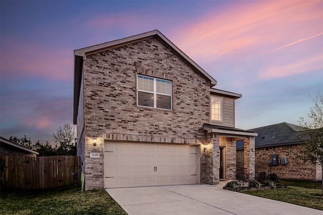 front of property with a garage