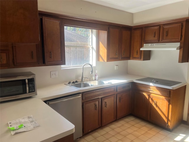 kitchen featuring sink and appliances with stainless steel finishes