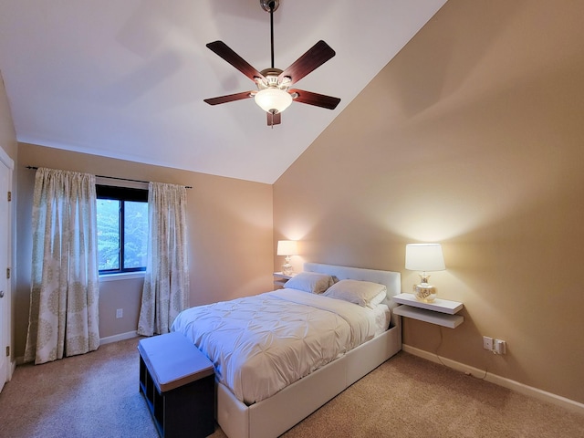 bedroom with ceiling fan, carpet, and lofted ceiling