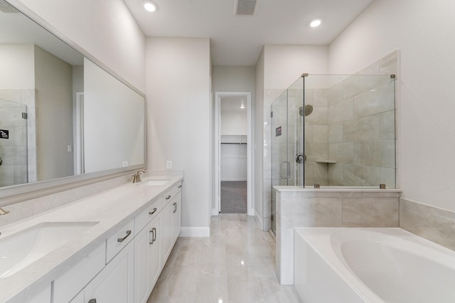 full bathroom with a garden tub, a shower stall, visible vents, and a sink