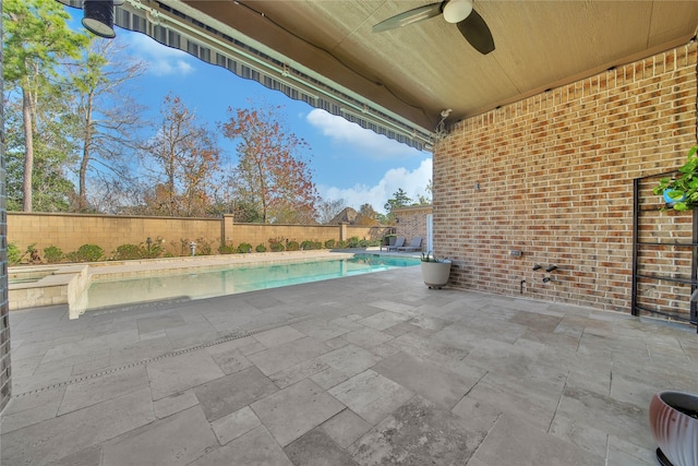 view of patio with ceiling fan