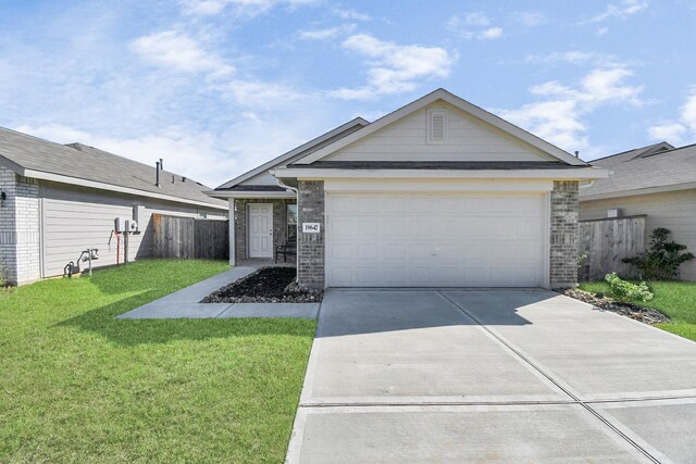 ranch-style house with a front yard and a garage