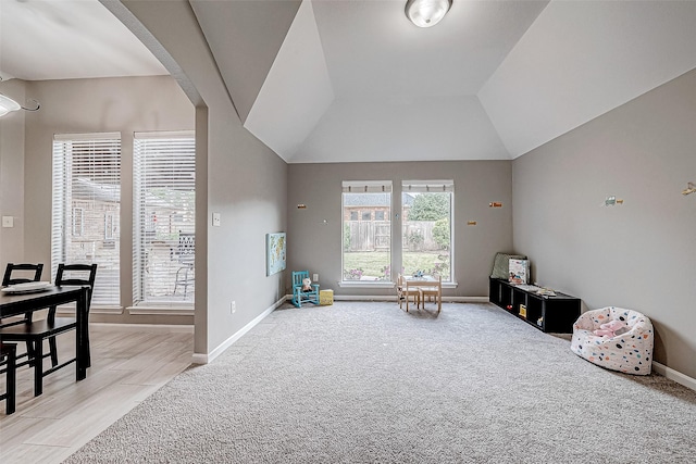 interior space featuring light colored carpet