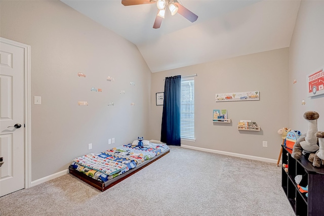 bedroom featuring ceiling fan, light colored carpet, and lofted ceiling